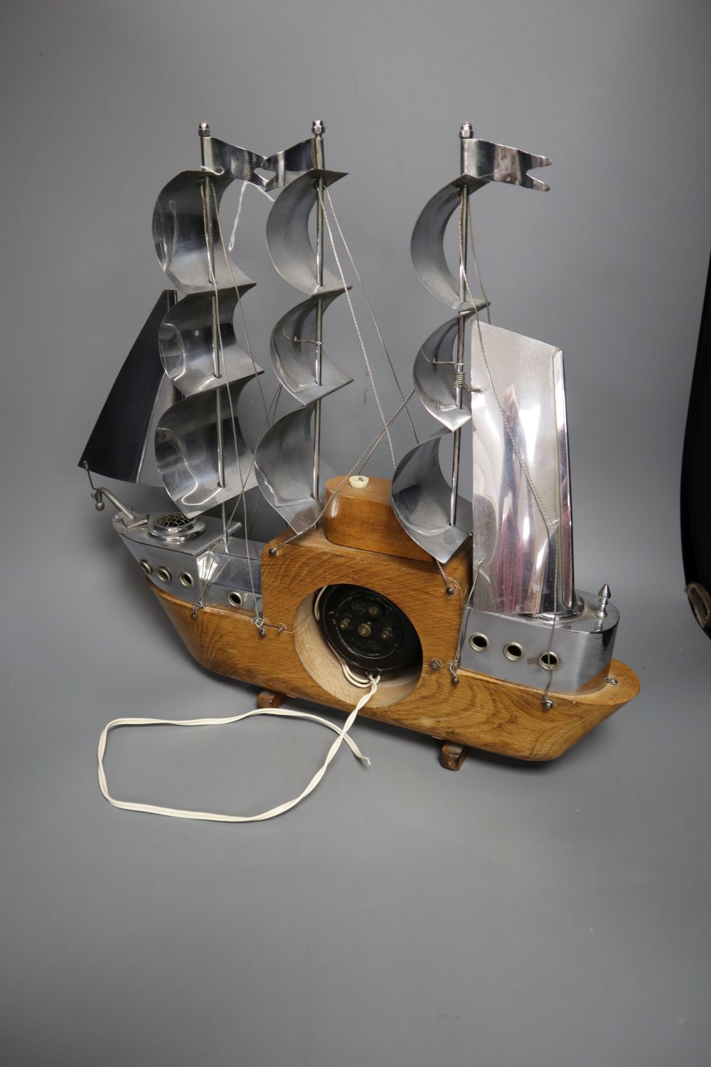 A novelty timepiece in the form a three-masted ship, Metamech Electric movement, 42cm